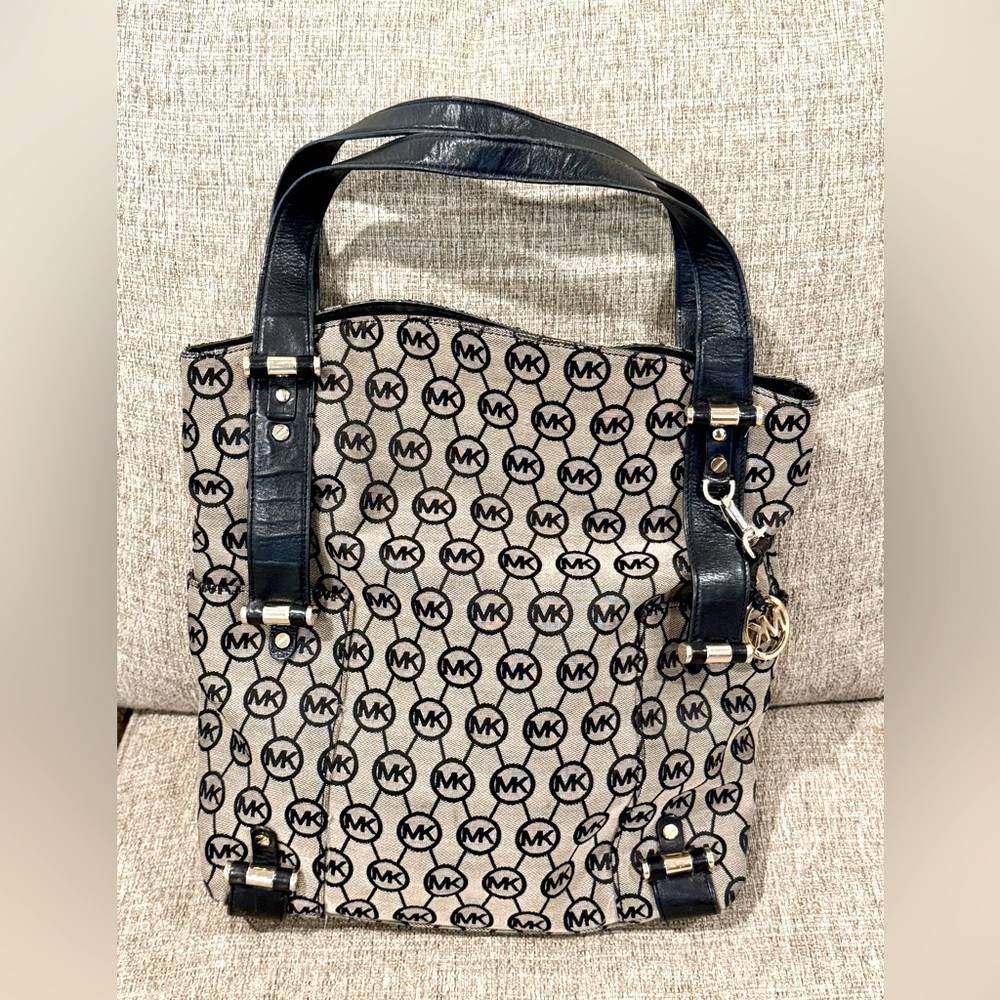 Michael Kors Black and Cream Totes with Structured Design